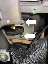 nuts/washers securing the instrument panel from underneath the dash